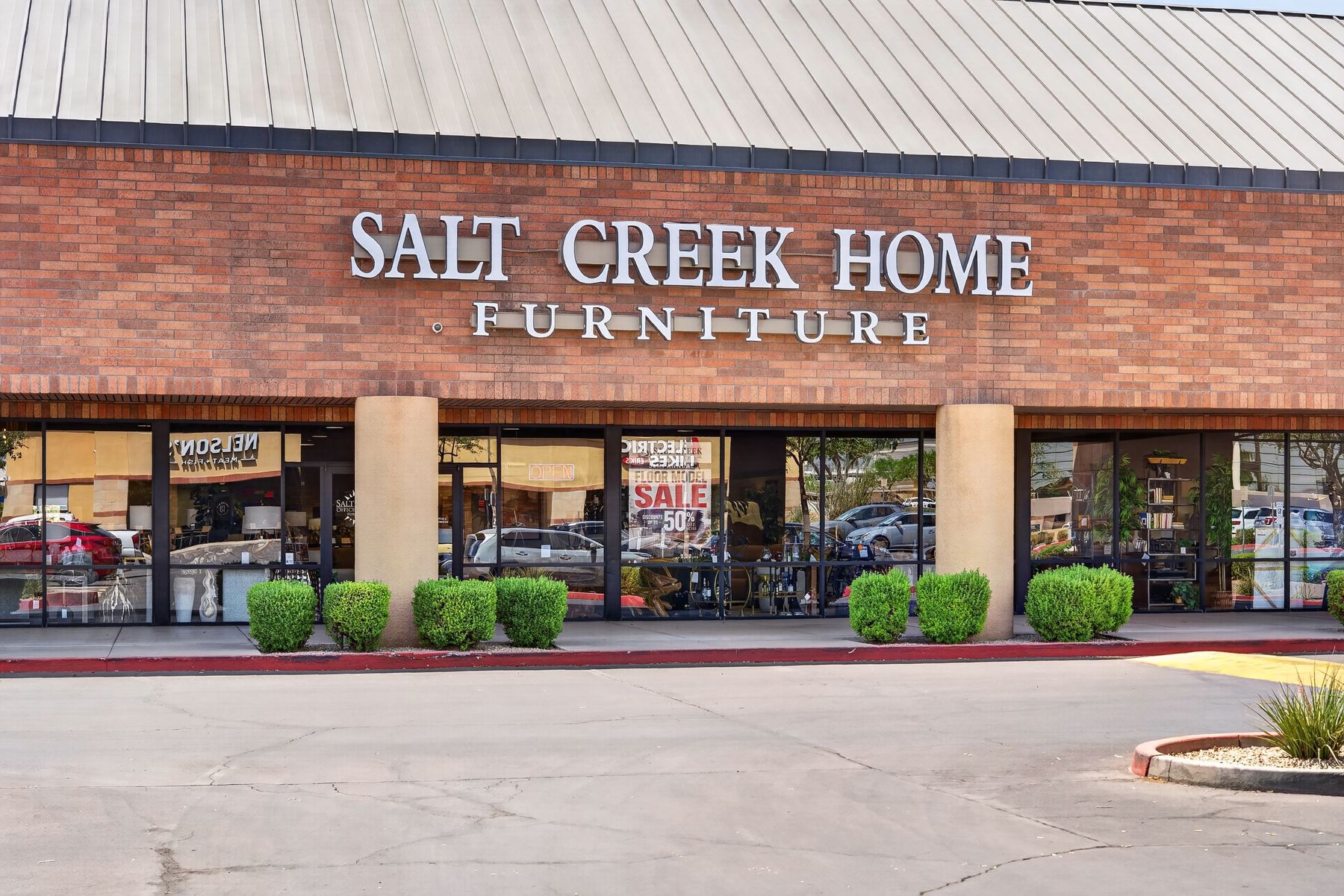 Brick storefront exterior of a Scottsdale home furniture store