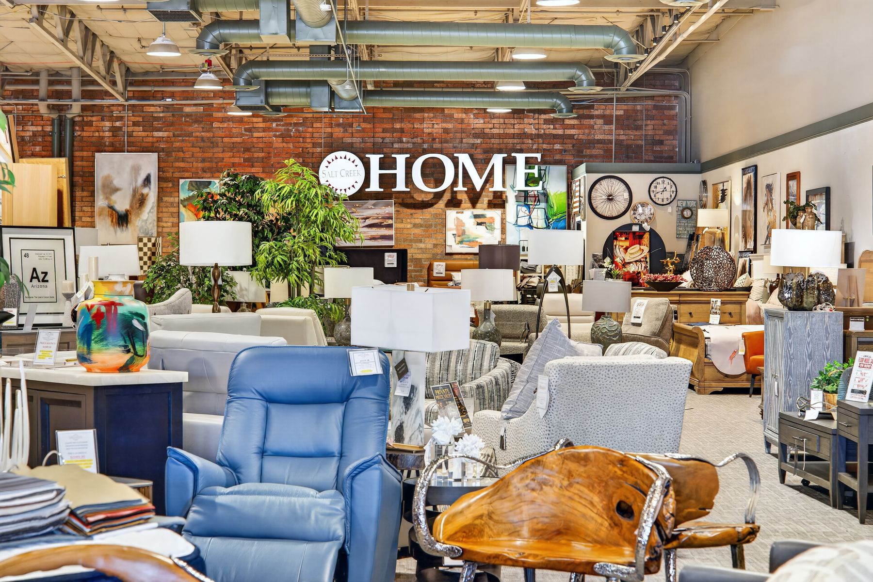Interior of a Scottsdale furniture showroom, exposed brick and open ceiling